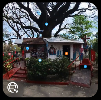 Photo of a small building dedicated to an Argentine hero with a tree behind the buildling.